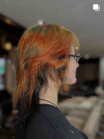 Ginger copper mullet, short on top and long at the back