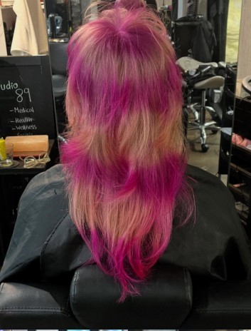 Long vivid pink hair, full freehand colour